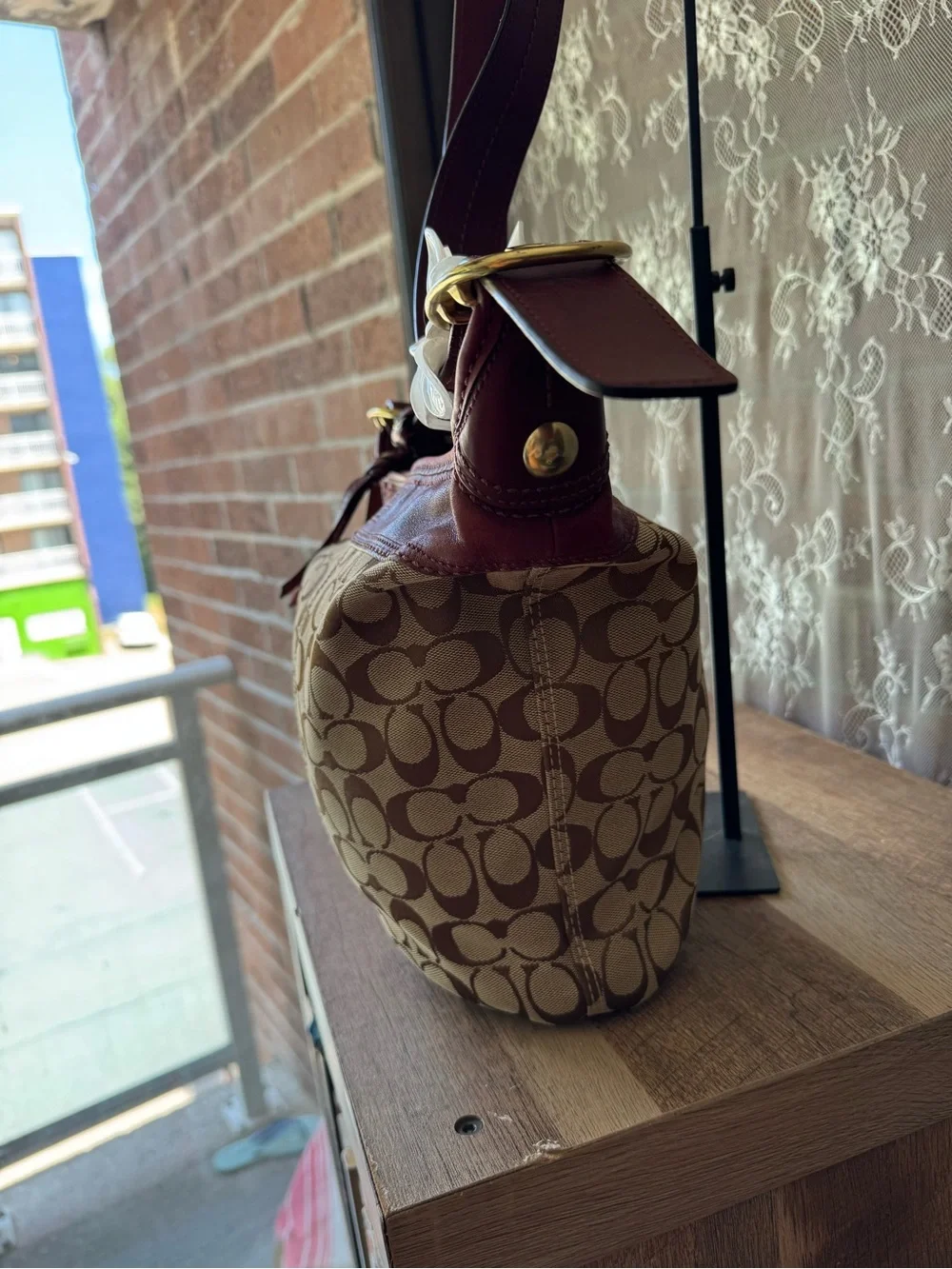 Coach Signature Canvas Bucket Bag with Burgundy Leather Trim